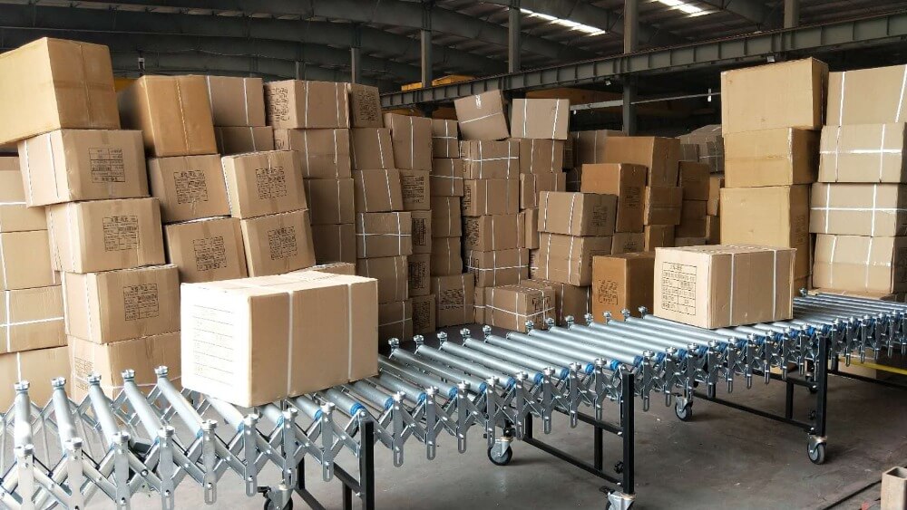 擋邊伸縮滾筒輸送機